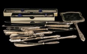 Miscellaneous Collection of Seventeen Silver Hilted Items comprising 3 large bread knives,