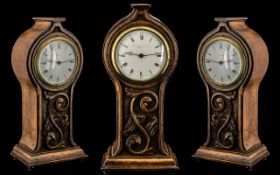 Art Nouveau Carved Oak Mantel Clock in a shaped, floral case, with a white enamel dial; Ferranti,