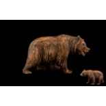 A Black Forest Bear - Carved Bear In Roaming Position, Height 4.5 Inches Length 8 Inches.