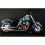 Pressed Tin Wall Plaque in the Shape of a Harley Davidson Motor Bike,