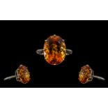 9ct Gold - Stunning Single Stone Topaz Set Ring of Large Proportions.