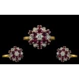 18ct Gold Attractive Ruby and Diamond Set Cluster Ring - Flower head Design. Full Hallmark for 18ct.