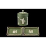 Green Jasper Wedgwood three pieces to include, one candy jar, and two oblong sweet dishes.