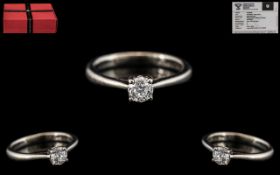 Forever Diamonds White Gold Single Stone Diamond Ring set with a round modified brilliant cut