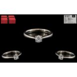 Forever Diamonds White Gold Single Stone Diamond Ring set with a round modified brilliant cut