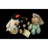 Two Small Steiff Toys, comprising a black Steiff Teddy Bear 1912 with moveable limbs and glass eyes,