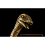 Brass Cobra Head Cane Walking Stick, the snakes tongue protruding from its mouth, ready to strike.