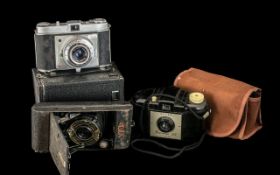 Collection of Four Vintage Cameras, various makes, Retinette, Ensign, Brownie No. 2, and Kodak 127.