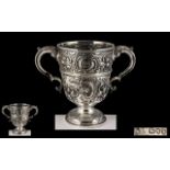 Victorian Period - Impressive and Fine Quality Sterling Silver Twin Handle Embossed Loving Cup.