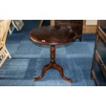 Georgian Mahogany Snap Top Table on Three Shaped Legs, with a turned centre column support,