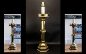 A Gothic Antique Brass Converted Candlestick Lamp of typical form, Measures 30 inches height.