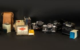 A Collection of Cameras to include Miranda Panorama, Polaroid Black and White 3000 land roll film,