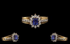 Ladies Attractive 9ct Gold Sapphire and Diamond Cluster Ring, Flower head Design. The Cornflower