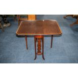 An Edwardian Mahogany Sutherland Table, of typical form, with satinwood inlay, square tapering legs,