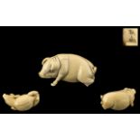 Japanese Meiji Period Carved Ivory Figure of a Pig, fully signed by the artist; originally of the