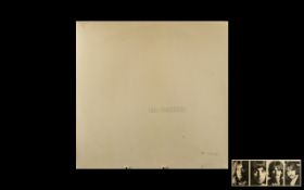 The Beatles 'White Album' Vinyl LP original issue gatefold with photos inside. Top opening.