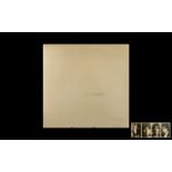 The Beatles 'White Album' Vinyl LP original issue gatefold with photos inside. Top opening.