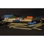 Box of Vintage Hornby Die Cast Trains including carriages, station box, tracks, etc.