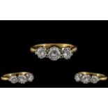 18ct Gold and Platinum - Attractive 3 Stone Diamond Set Ring In a Gallery Setting. The 3 Round