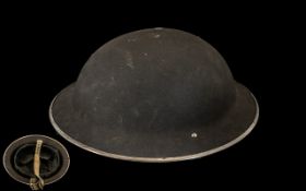 British Steel Helmet Mk2, dated 1938, with original liner and chin strap.