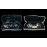Two Pairs of Vintage 'Harry Potter' Type Glasses, cased, horn rimmed with gold plated frames,