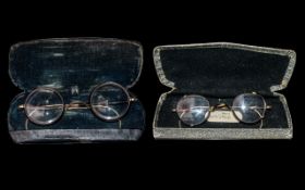 Two Pairs of Vintage 'Harry Potter' Type Glasses, cased, horn rimmed with gold plated frames,