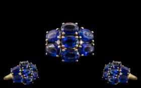 Ladies - 9ct Gold Attractive Blue Sapphire Set Cluster Ring of Good Design / Setting.
