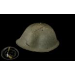 British Steel Helmet, turtle pattern, with original liner dated 1952, and chin strap.