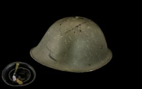 British Steel Helmet, turtle pattern, with original liner dated 1952, and chin strap.