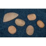 Five Stone Age Grinding Stones used on corn grinding, together with a piece from a grinding bowl,