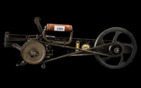 Rare Singer Iron Carpet Stitching Machine, hand held with crank; stamped Simand, USA, 7951, Number