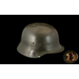 WW2 German Helmet complete with liner.