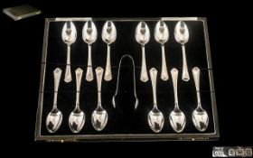 James Porter & Son ( Glasgow Retailers ) Boxed Set of 12 Silver Tea Spoons and Matching Sugar Nips.