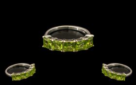 Peridot Five Stone Band Ring, five square cut peridots totalling 3.