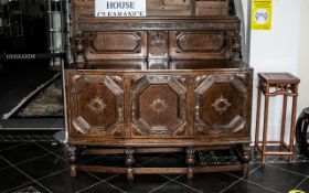 Early 20th Century Oak Carved Sideboard/Court Dresser of solid proportions,