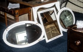 Collection of Four Mirrors in White Painted Frames, measuring 29" x 27", 24" x 22",