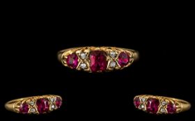 Antique Period 18ct Gold Attractive Ruby and Diamond Set Ring in a gypsy-gallery setting,