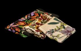 Collection of Four Liberty of London Scarves comprising a fine wool 25" square floral scarf in