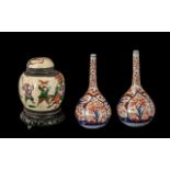 Pair of Small Tear Drop Shaped Imari Vases, Meiji period; 7 inches (17.