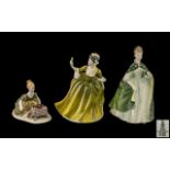 Two Royal Doulton Figures comprising 'Simone' HN 2378, measures 8" tall; and 'Premiere' HN 2343, 8.