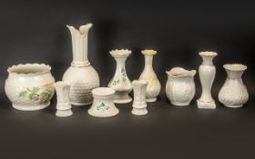 Collection of Belleek Irish Porcelain, comprising a large pot planter, an 11" long neck vase,