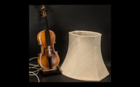 A Contemporary Table Lamp in the form of an Adapted Violin with shade.