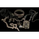 A 17 inch Silver Necklace Stylised Figure of 8 Links, together with a similar style 8 inch bracelet,