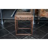 Chinese Antique Hardwood Side Table with a burr root top, intricate carved interlacing frieze design