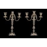 A Pair of Silver Plated Decorative Two B