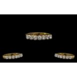 Ladies Attractive 18ct Gold Seven Stone