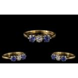 Ladies 9ct Gold Attractive 3 Stone Sapphire and Diamond Set Ring. Fully Hallmarked for 9.375.