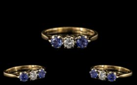 Ladies 9ct Gold Attractive 3 Stone Sapphire and Diamond Set Ring. Fully Hallmarked for 9.375.