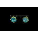 Peacock Quartz Solitaire Stud Earrings, each of the round cut,