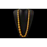 Amber Bakelite Necklace. Early 20th Century beaded necklace, weight 101 grams.